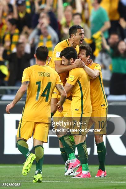 Tim Cahill of Australia celebrates scoring a goal during the 2018 FIFA World Cup Asian Playoff match between the Australian Socceroos and Syria at...