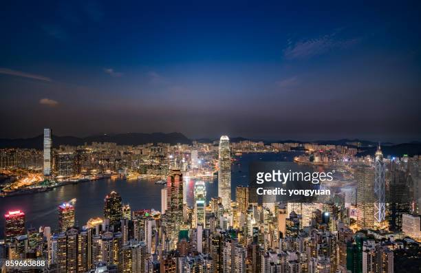 aerial view of hong kong at night - yongyuan hongkong stock pictures, royalty-free photos & images