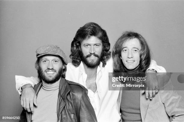 The Bee Gees back in London 22nd November 1981, From left to right: Maurice Gibb, Barry Gibb, Robin Gibb.