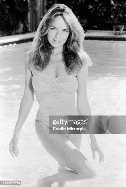 Catherine Bach actress who stars as Daisy Duke in tv series The Dukes of Hazard; pictured at home in Los Angeles California May 1982, Catherine is...