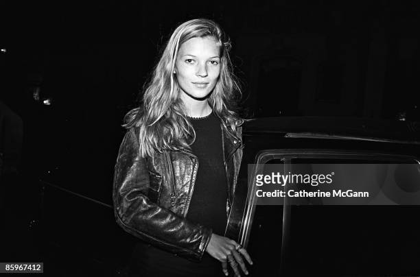 British supermodel Kate Moss arrives at a party for John Waters' film "Serial Mom" in 1994 in New York City, New York.