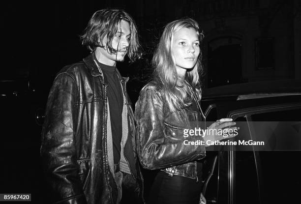 British supermodel Kate Moss and American actor Johnny Depp leaving a party for John Waters' film "Serial Mom" in 1994 in New York City, New York.