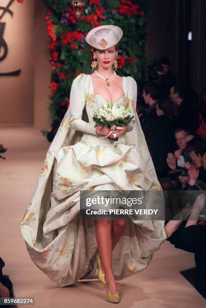 German top model Claudia Schiffer displays the wedding gown 22 January 1997 in Paris, as part of Yves Saint Laurent 's spring-summer haute couture...