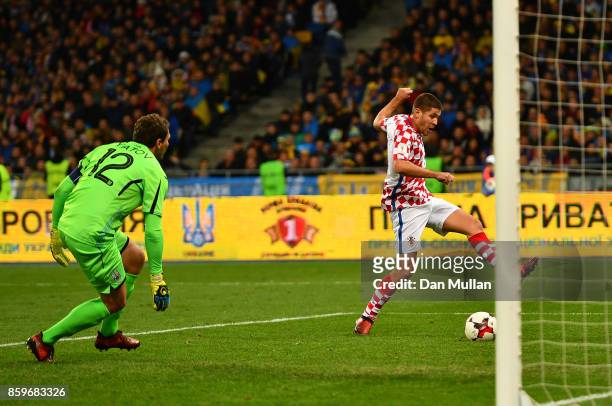 Andrej Kramaric of Croatia scores his side's second goal past Andriy Pyatov of Ukraine during the FIFA 2018 World Cup Qualifier Group I match between...