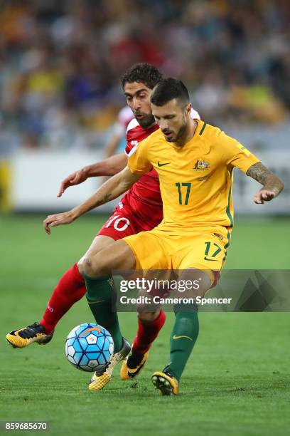 Nikita Rukavytsya of Australia and Firas Alkhatib of Syria contest the ball during the 2018 FIFA World Cup Asian Playoff match between the Australian...