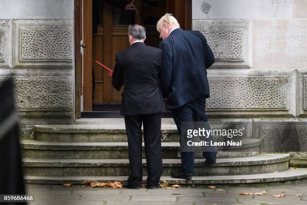 International Trade Secretary Liam Fox and Foreign Secretary Boris Johnson talk after leaving Downing Street, following a Cabinet meeting on October...