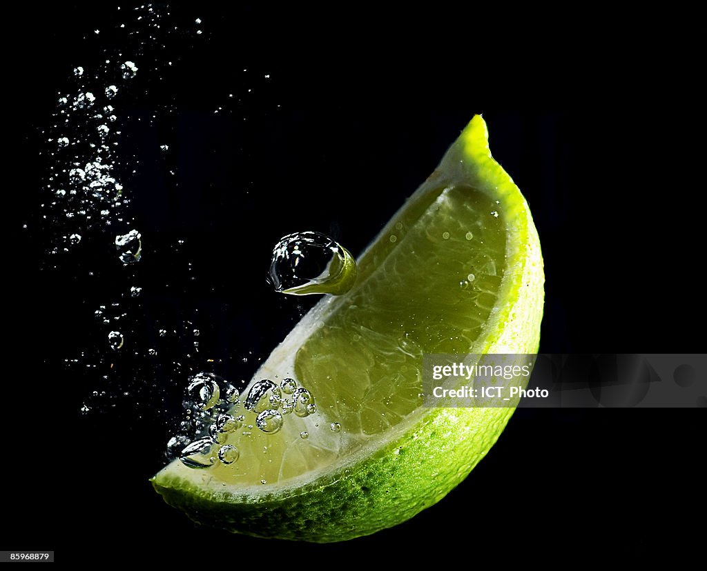 Lime wedge and bubbles