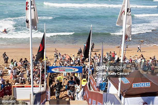 Nine time ASP World Champion Kelly Slater of the United States makes his way through the crowd for his Round 2 heat of the Rip Curl Pro against event...