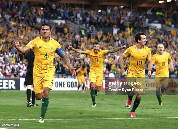 Tim Cahill of Australia celebrates after scoring his teams second goal during the 2018 FIFA World Cup Asian Playoff match between the Australian...
