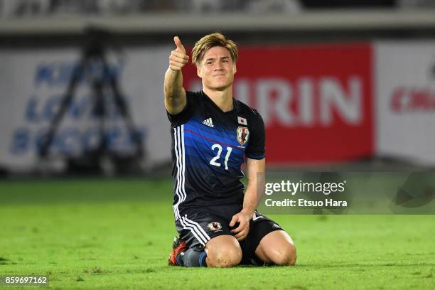 Gotoku Sakai of Japan thumbs up during the international friendly match between Japan and Haiti at Nissan Stadium on October 10, 2017 in Yokohama,...