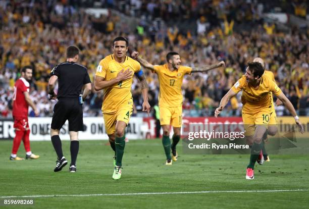 Tim Cahill of Australia celebrates after scoring his teams second goal during the 2018 FIFA World Cup Asian Playoff match between the Australian...