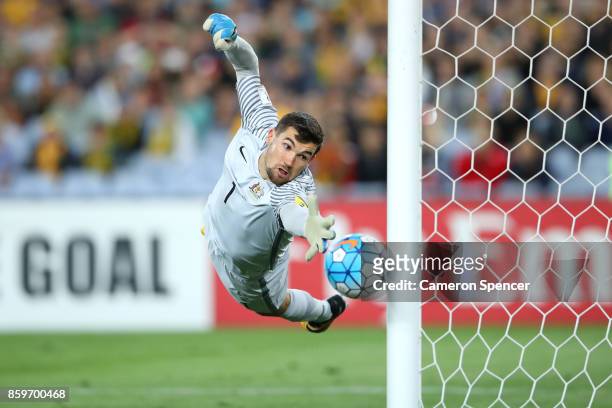 Mathew Ryan of Australia saves a goal during the 2018 FIFA World Cup Asian Playoff match between the Australian Socceroos and Syria at ANZ Stadium on...