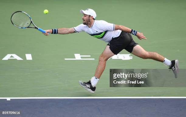 Jordan Thompson of Australia returns a shot to Diego Schwartzman of Argentina in their match during Round 1 of Men's Single on Day 3 of 2017 ATP...