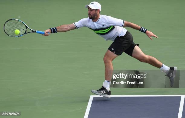 Jordan Thompson of Australia returns a shot to Diego Schwartzman of Argentina in their match during Round 1 of Men's Single on Day 3 of 2017 ATP...