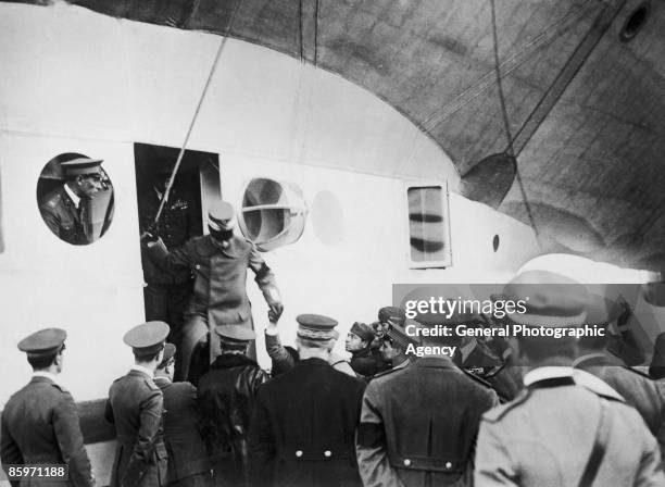 King Victor Emmanuel III of Italy stepping out of the gondola of the airship Norge, Rome, March 1926. The Italian-built, semi-rigid dirigible is due...