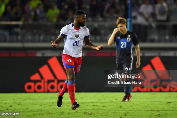 Duckens Nazon of Haiti celebrates scoring his side7s third goal during the international friendly match between Japan and Haiti at Nissan Stadium on...