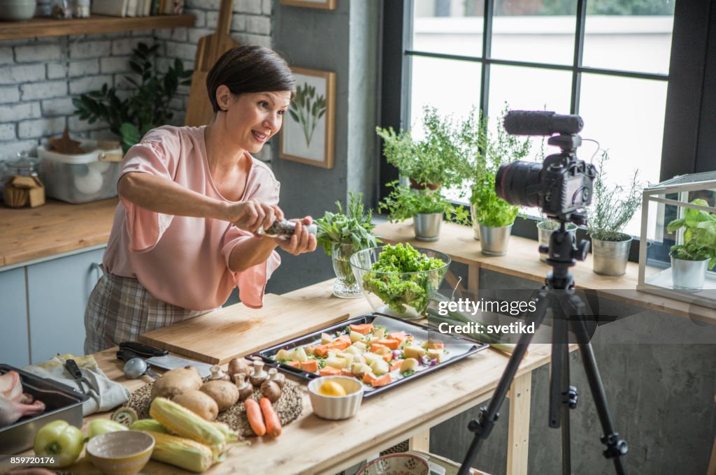 She is enjoying at cooking and vlogging