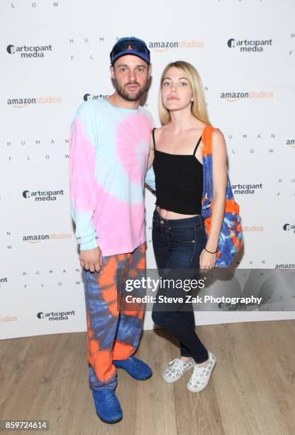 Gordon Stevenson and Smantha Flynn attend "Human Flow" New York Screening at the Whitby Hotel on October 9, 2017 in New York City.