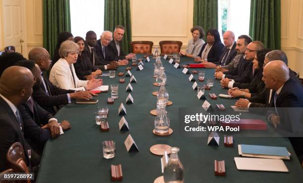 Britain's Prime Minister, Theresa May hosts a discussion in the Cabinet Office, following the publication of the Government's Race Disparity Audit at...