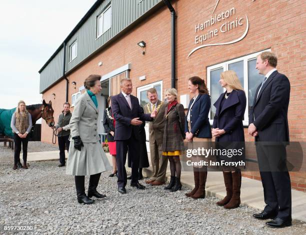 Princess Anne, Princess Royal, meets the practice partners as she arrives to visit the Hambleton Equine Clinic on October 10, 2017 in Stokesley,...