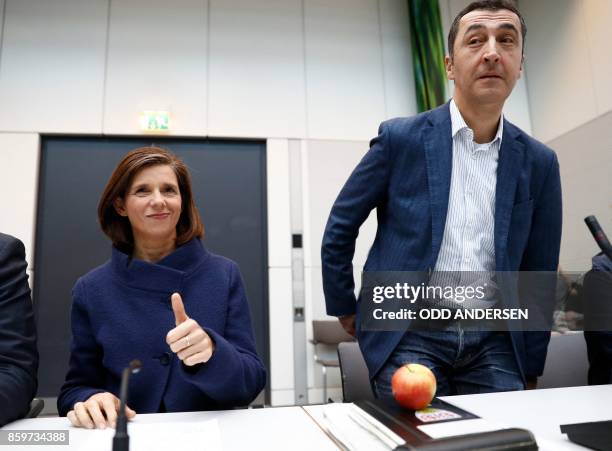 Parliamentary group leader Katrin Göring-Eckardt and the co-leader of German Greens Party "BÜNDNIS 90/DIE GRÜNEN" Cem Oezdemir take a seat prior to a...