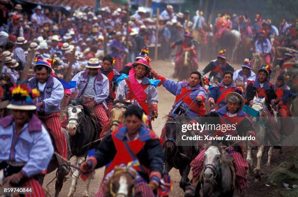 Horse race of Mam Mayans during the village's annual patron saint celebration, which begins on All Saints Day and ends on the Day of the Dead, when...