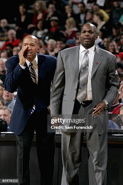 Assistant coach Monty Williams and head coach Nate McMillan of the Portland Trail Blazers call plays during the game against the Dallas Mavericks on...