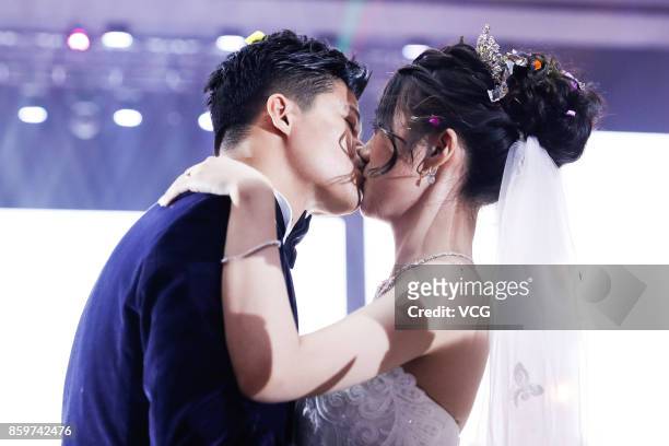 Chinese sprinter Su Bingtian and wife Lin Yanfang hold their wedding ceremony on October 10, 2017 in Zhongshan, Guangdong Province of China.