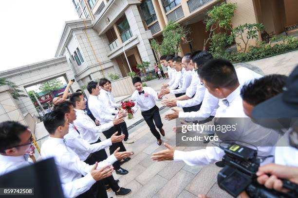 Chinese sprinter Su Bingtian and wife Lin Yanfang hold their wedding ceremony on October 10, 2017 in Zhongshan, Guangdong Province of China.