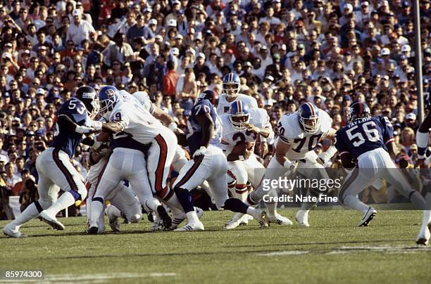 Denver Broncos running back Sammy Winder carries the football and looks for room to run during the Broncos 39-20 loss to the New York Giants in Super...