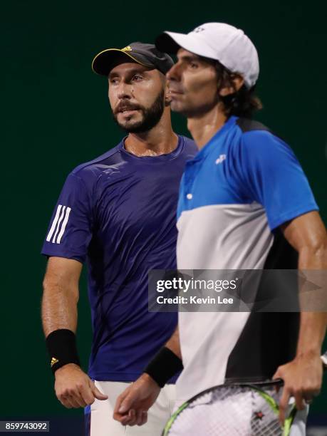 Santiago Gonzalez of Mexico and Julio Peralta of Chile in action against Paolo Lorenzi of Italy and Albert Ramos-Vinolas of Spain during Men's Double...