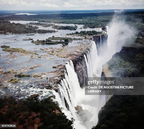 Victoria Falls , Zambia-Zimbabwe border, Mosi-oa-Tunya National Park in Zambia, and Victoria Falls Park in Zimbabwe.