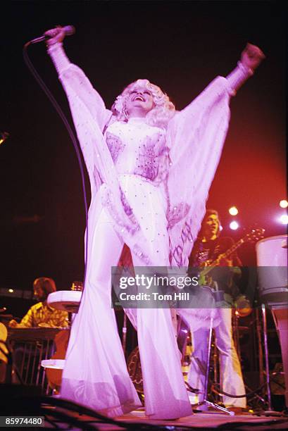 Country singer Dolly Parton performs at Georgia Tech's Alexander Memorial Coliseum on October 22, 1977 in Atlanta, Georgia.