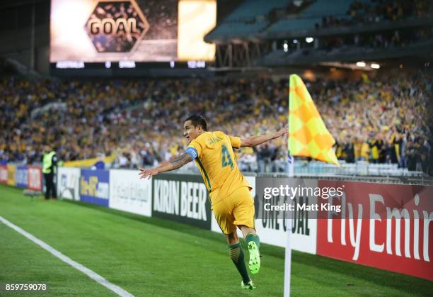 Tim Cahill of Australia celebrates scoring their first goal during the 2018 FIFA World Cup Asian Playoff match between the Australian Socceroos and...