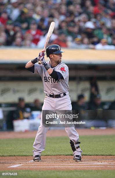 Dustin Pedroia of the Boston Red Sox bats against the Oakland Athletics during a Major League Baseball game on April 13, 2009 at the Oakland Coliseum...