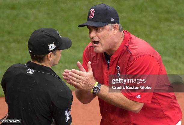 Boston Red Sox manager John Farrell pleads his case after being tossed in the second inning of an elimination loss to the Astros. The Boston Red Sox...