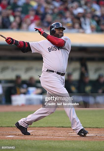 David Ortiz of the Boston Red Sox bats against the Oakland Athletics during a Major League Baseball game on April 13, 2009 at the Oakland Coliseum in...