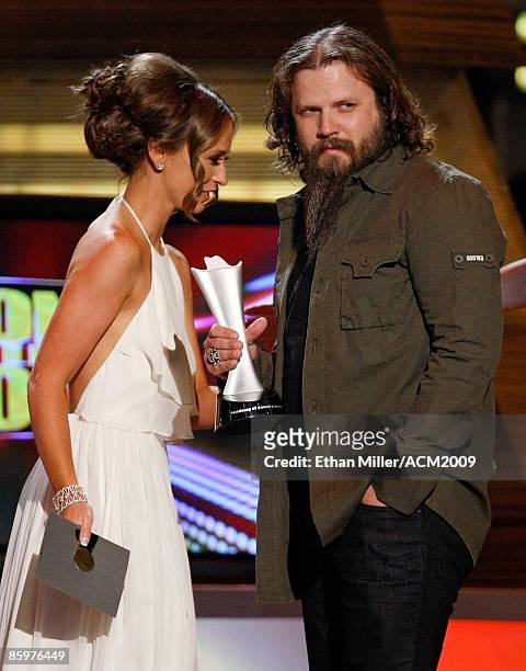 Music artist Jamey Johnson accepts the award for Song of the Year from actress Jennifer Love Hewitt during the 44th annual Academy of Country Music...