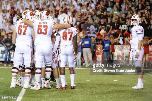 Quarterback Alex Hornibrook of the Wisconsin Badgers looks to the bench before a play against the Nebraska Cornhuskers at Memorial Stadium on October...