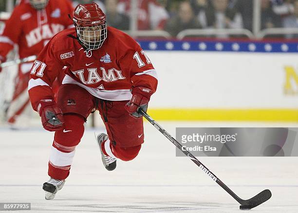 Carter Camper of the Miami Red Hawks heads for the net against the Boston Terriers during the NCAA Men's Frozen Four Championship game on April 11,...