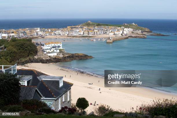 The sun shines on properties in the town of St Ives which has introduced measures to limit the number of second homes in St Ives on October 10, 2017...
