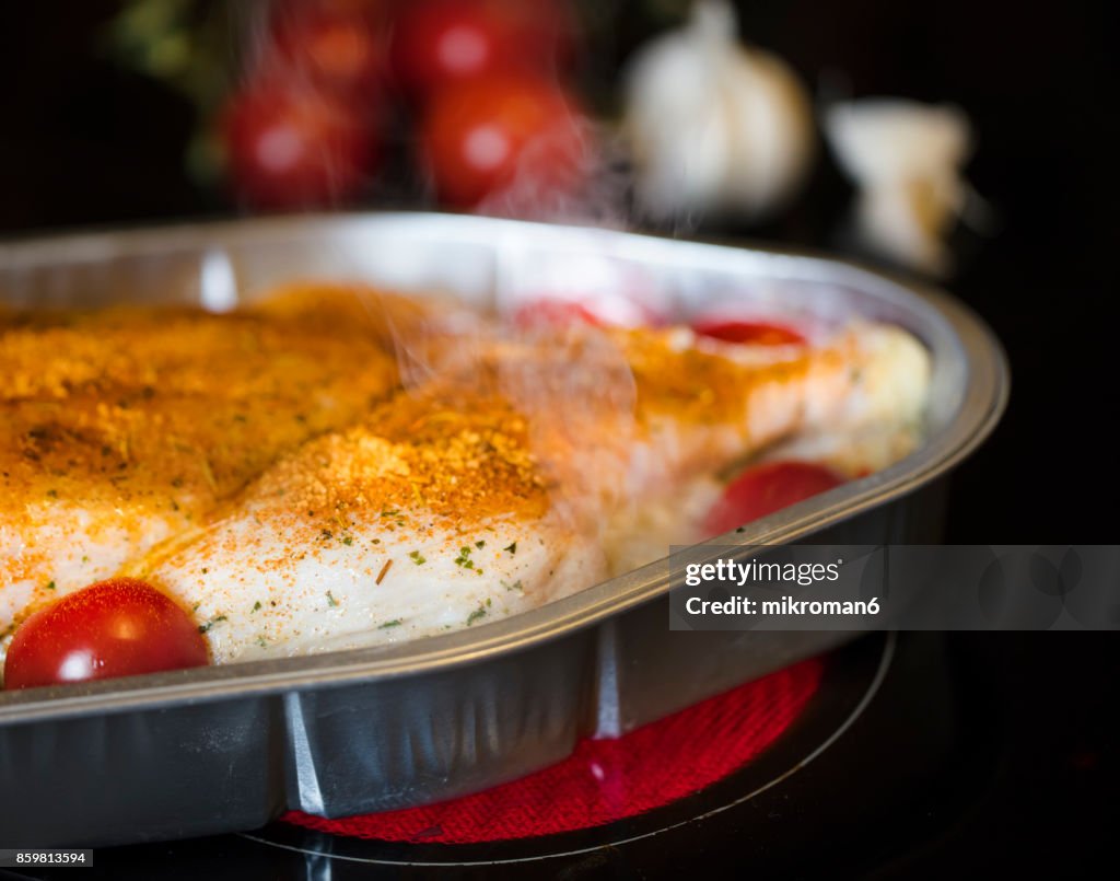 Chicken Prepared For Roasting on hot Electric Hob