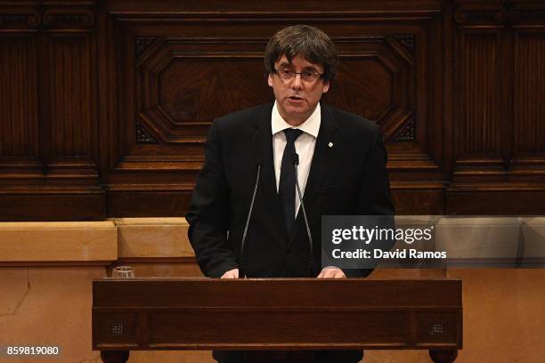 President of Catalonia, Carles Puigdemont, speaks in his address to the Catalan Parliament at the Palau del Parlament de Catalunya on October 10,...