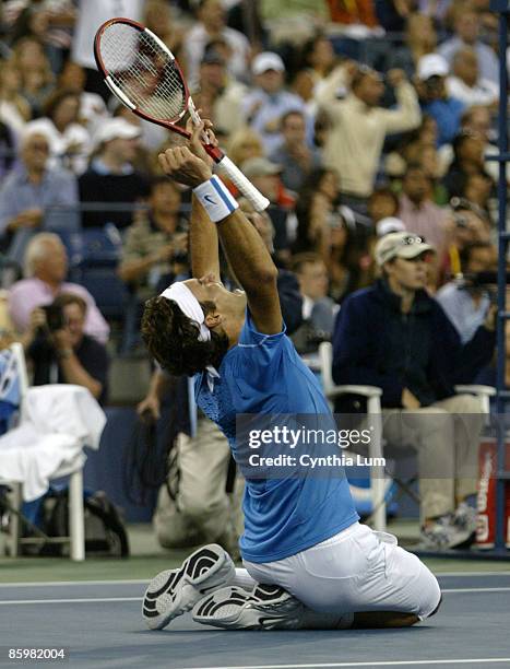 Roger Federer of Switzerland, captures the 2006 US Open title, defeating Andy Roddick of the USA, 6-2, 4-6, 7-7, 6-1 at The USTA Billie Jean King...