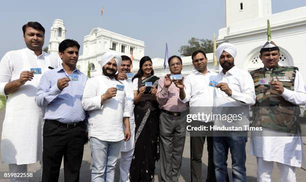 MLAs Rituraj, Naresh Kumar, Jarneal Singh, Alka Lamba, Anil Bajpai, Ajay Dutt, Jagdeep Singh, Commando Surinder Kumar show their metro card, when...