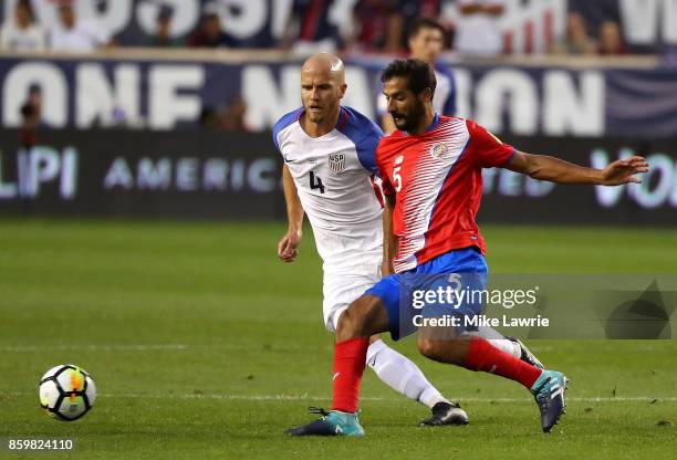 Michael Bradley of the United States and Celso Borges of Costa Rica compete for the ball during the FIFA 2018 World Cup Qualifier at Red Bull Arena...