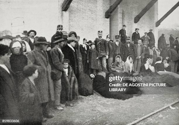 Survivors of the earthquake awaiting the train at the station of Cerchio, Abruzzo, Italy, photo by Garzini and Pizzini, from L'Illustrazione...