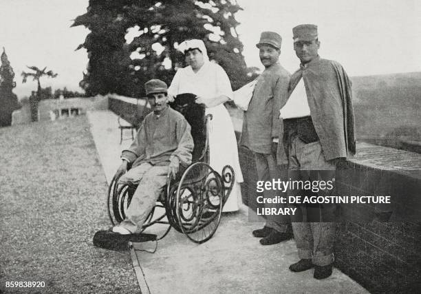 Princess Maria Letizia Bonaparte with wounded soldiers at the Moncalieri Hospital where she volunteered as a nurse, Italy, World War I, from...