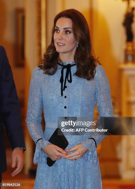 Britain's Catherine, Duchess of Cambridge takes part in a reception at Buckingham Palace to celebrate World Mental Health Day in central London on...