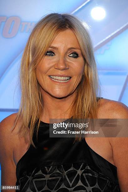 Actress Michelle Collins arrives at the premiere Of MGM Home Entertainment's "Into The Blue 2: The Reef" on April 14, 2009 at the poolside Beverly...